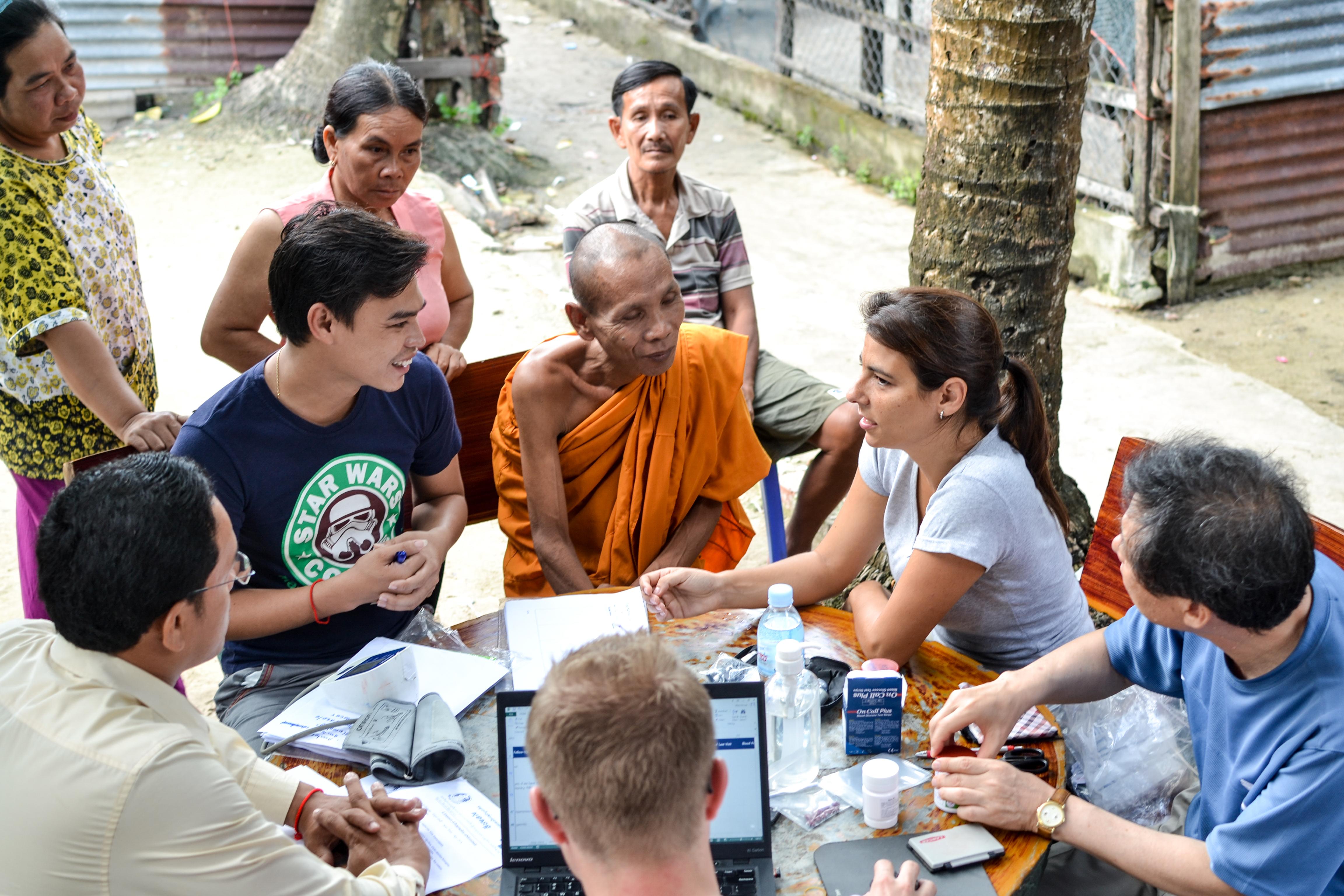 An intern giving a talk to locals during an outreach as part of her public health internship in Cambodia with Projects Abroad. An intern is seen talking to locals during an outreach whilst she completes her public health internship in Cambodia with Projects Abroad.